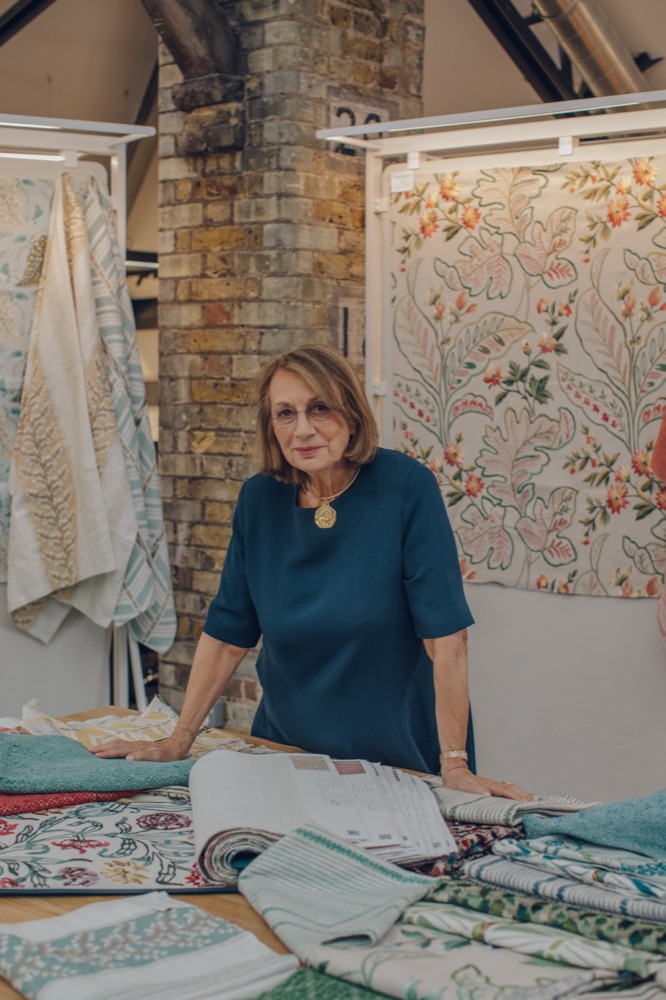 Nina Campbell with fabric samples in her studio
