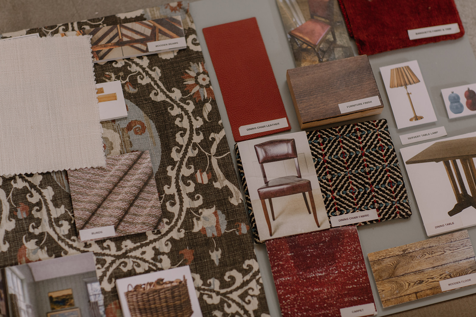 A designer’s mood board of fabric and paint samples